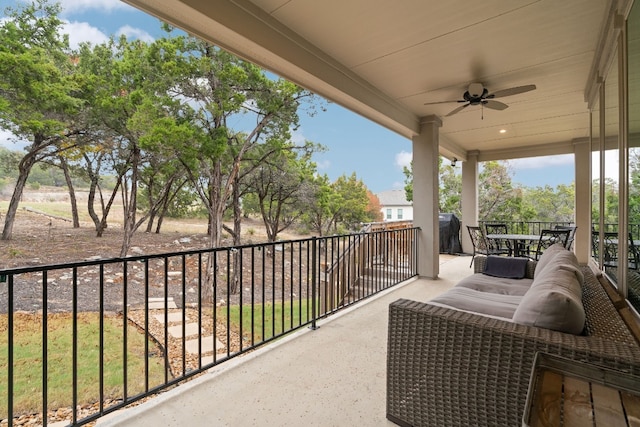 balcony featuring ceiling fan and a grill