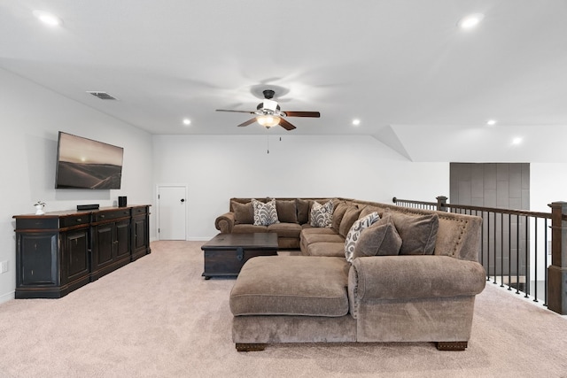 living room featuring ceiling fan and light carpet