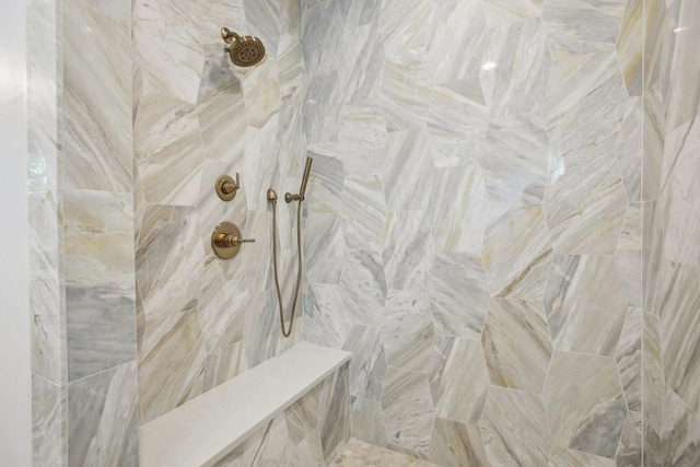 room details with a tile shower