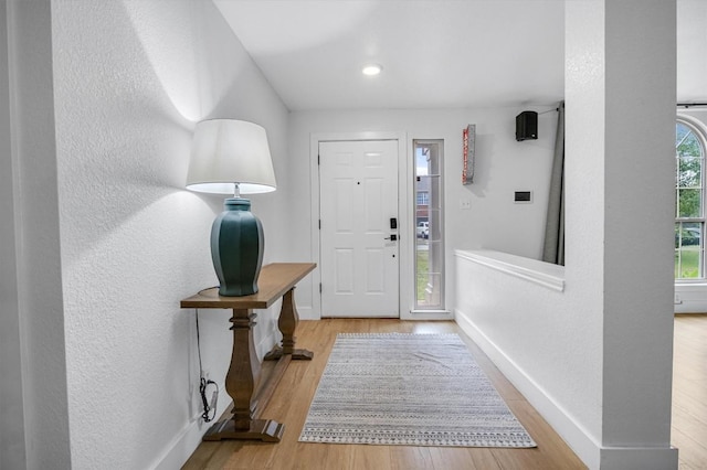 foyer entrance featuring light hardwood / wood-style flooring