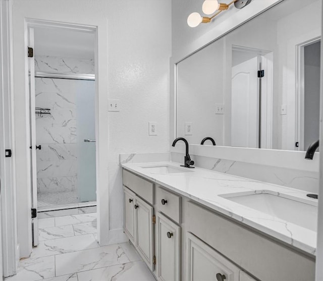 bathroom with vanity and walk in shower