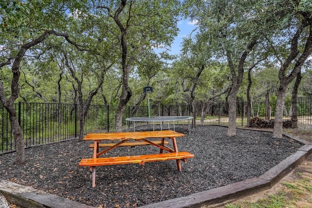 view of home's community with a trampoline