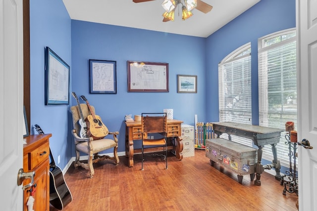 office space with ceiling fan and wood-type flooring