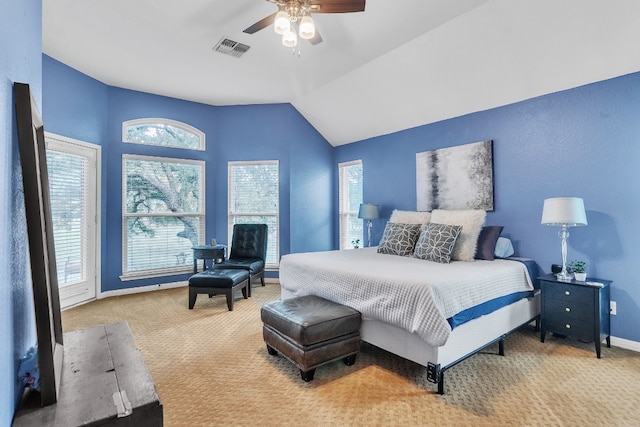 bedroom with carpet floors, vaulted ceiling, and ceiling fan