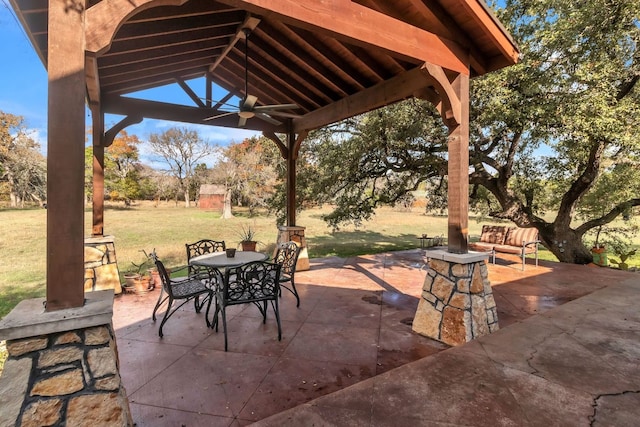 view of patio with a gazebo and ceiling fan