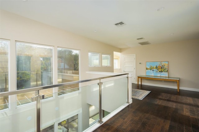 hall featuring dark hardwood / wood-style floors