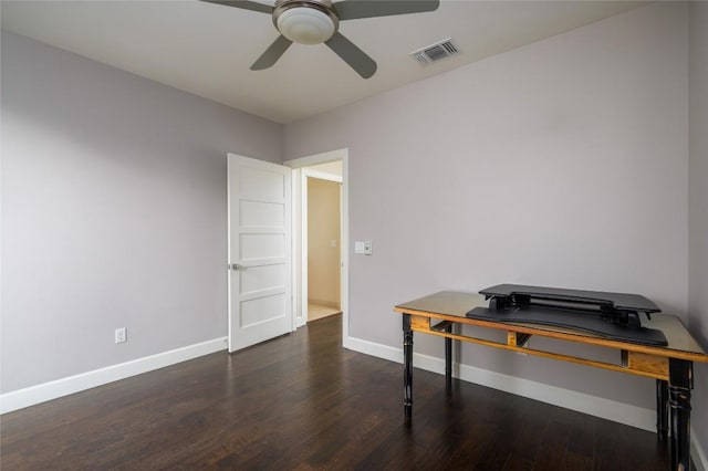 home office featuring ceiling fan and dark hardwood / wood-style flooring