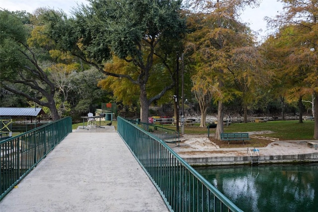 view of home's community with a water view