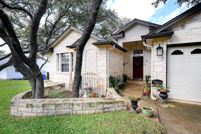 view of front of property with a garage