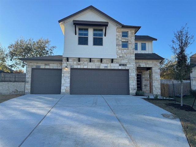 view of front of house with a garage