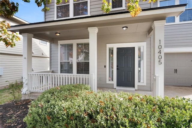 doorway to property with a porch