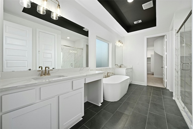 149 Golden Sage Ave, Georgetown, TX 78633 - full bath with a marble finish shower, two vanities, a freestanding tub, and recessed lighting