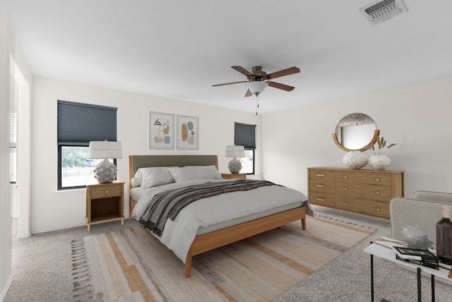 carpeted bedroom with ceiling fan