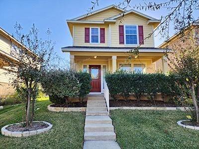 view of front facade with a front yard