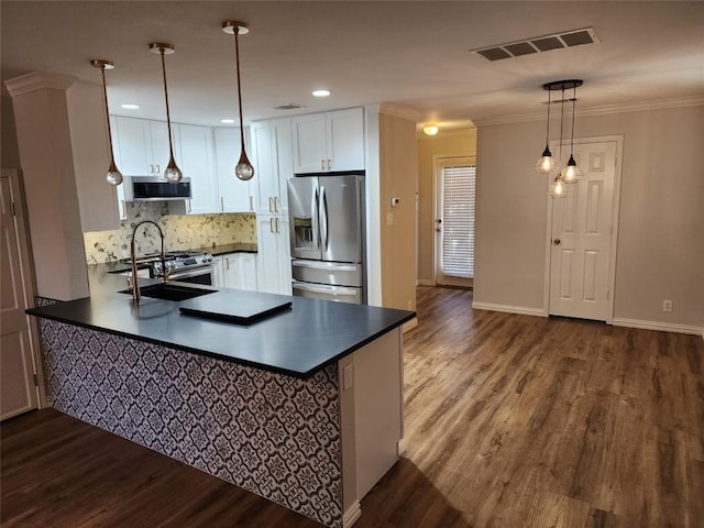 kitchen featuring kitchen peninsula, white cabinets, hanging light fixtures, and stainless steel refrigerator with ice dispenser