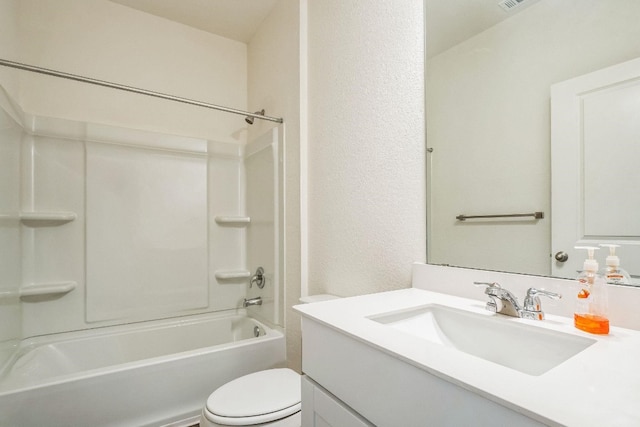 full bathroom with vanity, toilet, and washtub / shower combination