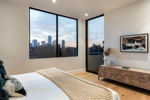 bedroom with light wood-type flooring