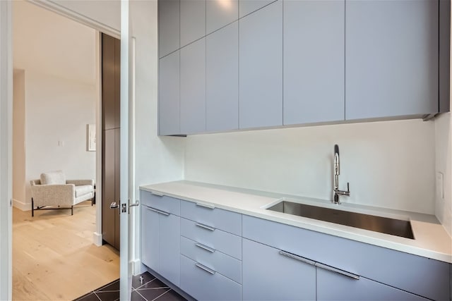 interior space with sink and dark hardwood / wood-style floors