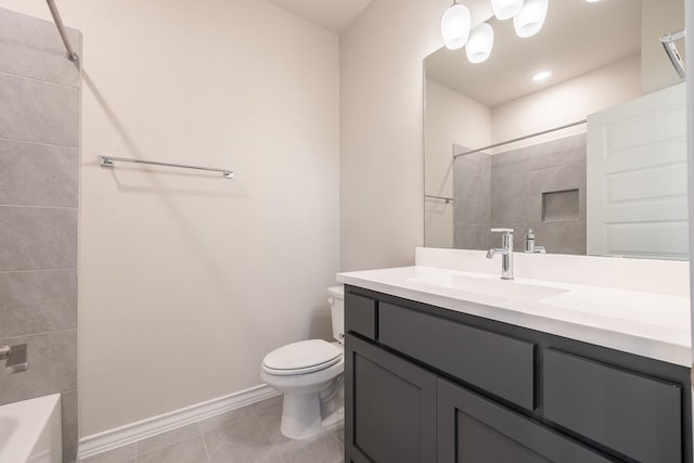 full bathroom with tile patterned flooring, vanity, tiled shower / bath combo, and toilet