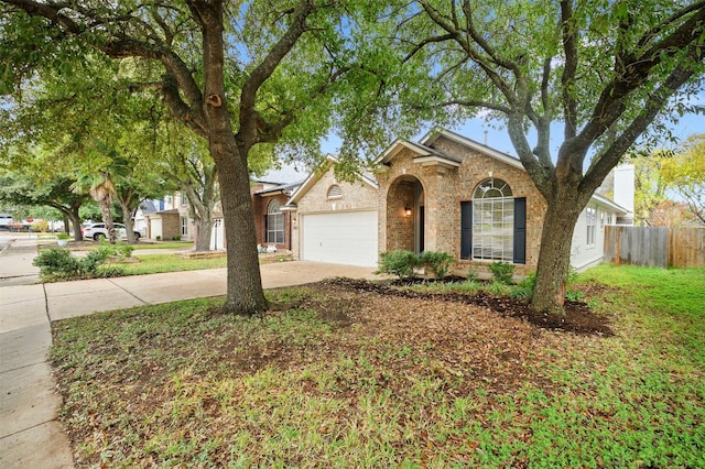 single story home featuring a garage