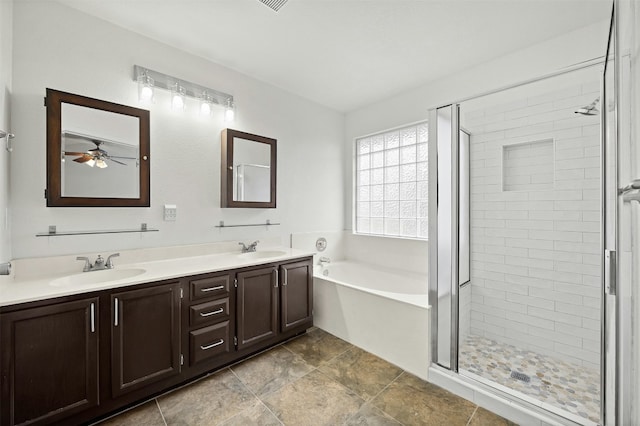 bathroom featuring separate shower and tub, ceiling fan, and vanity