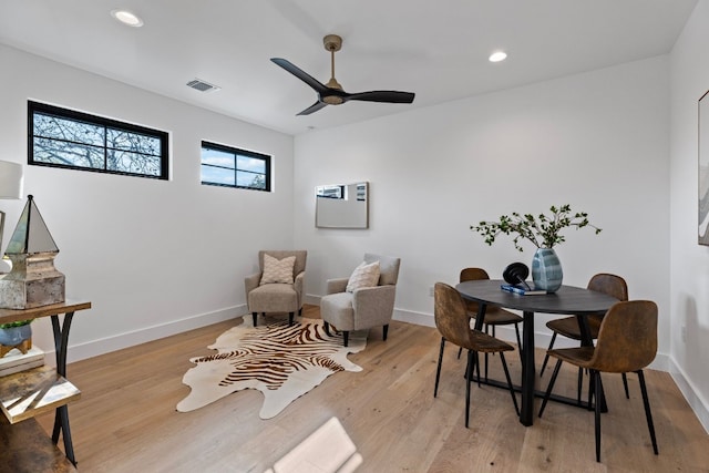 sitting room featuring ceiling fan and light hardwood / wood-style flooring