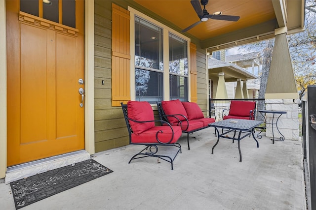 view of patio / terrace with ceiling fan and a porch