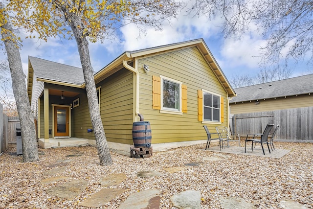 back of property with a patio area