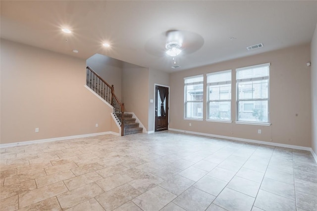 interior space featuring ceiling fan