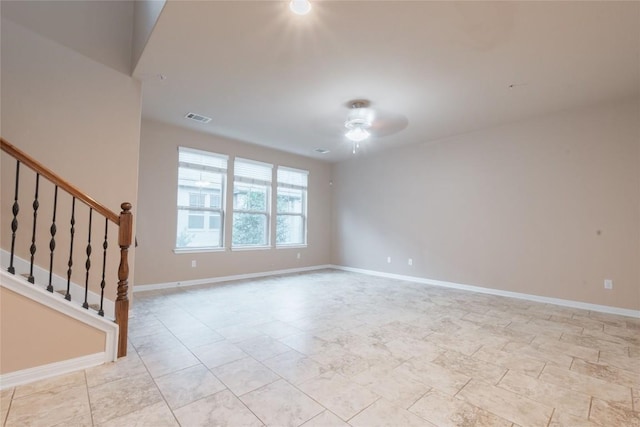 unfurnished room featuring ceiling fan