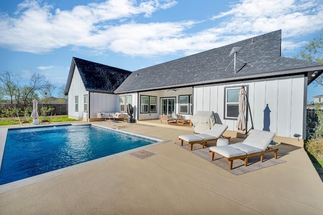 view of swimming pool featuring ceiling fan, an outdoor hangout area, and a patio