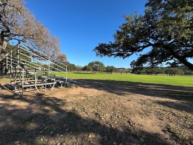 view of yard with a rural view