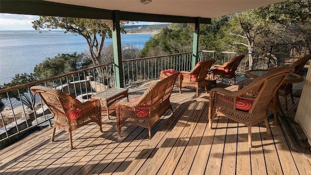 deck featuring a water view