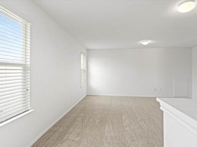 empty room with carpet flooring