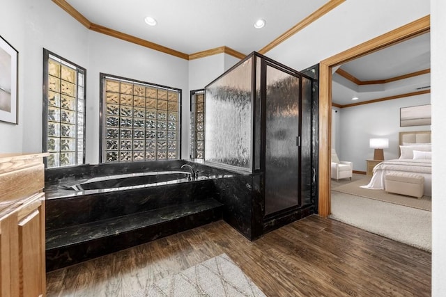 bathroom featuring vanity, shower with separate bathtub, wood-type flooring, and crown molding