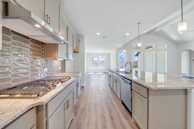 413 Canton Chase, Cibolo, TX 78108 - kitchen with wall chimney exhaust hood, stainless steel appliances, backsplash, light wood-style flooring, and a sink