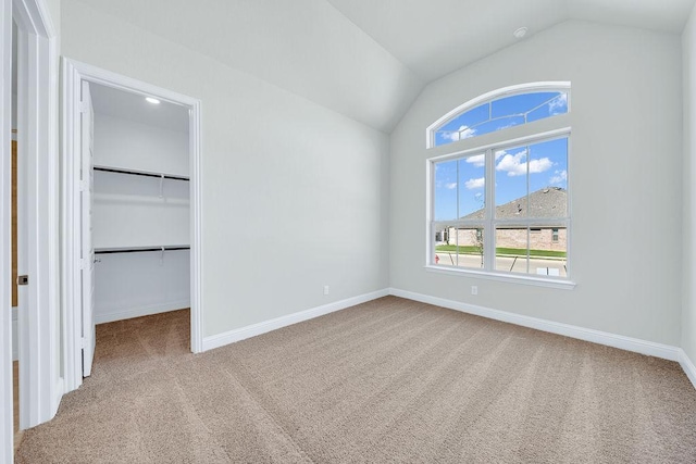 413 Canton Chase, Cibolo, TX 78108 - unfurnished bedroom with vaulted ceiling, carpet floors, a spacious closet, baseboards, and a closet