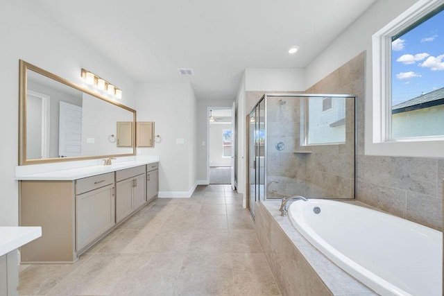 413 Canton Chase, Cibolo, TX 78108 - full bathroom featuring vanity, plenty of natural light, a bath, a stall shower, and recessed lighting