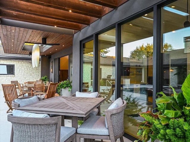 sunroom / solarium with wooden ceiling