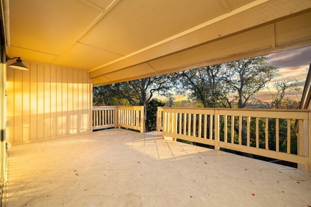 view of patio terrace at dusk