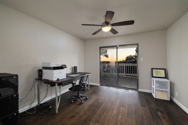 office space featuring dark hardwood / wood-style floors and ceiling fan