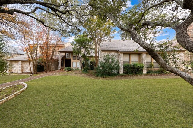 exterior space with a front yard