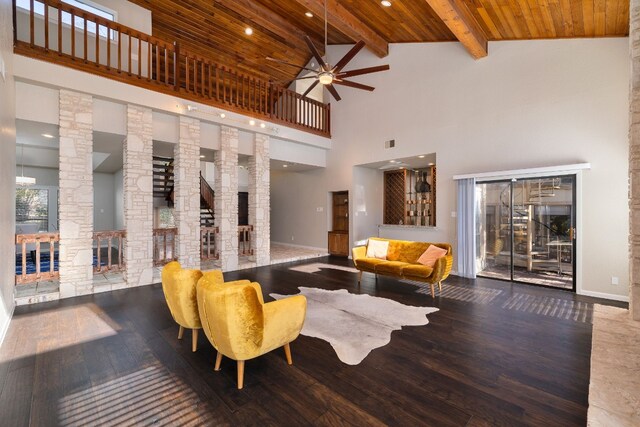 living room featuring ornate columns, ceiling fan, wooden ceiling, high vaulted ceiling, and wood-type flooring