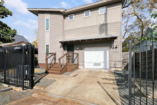 view of front of property featuring a garage