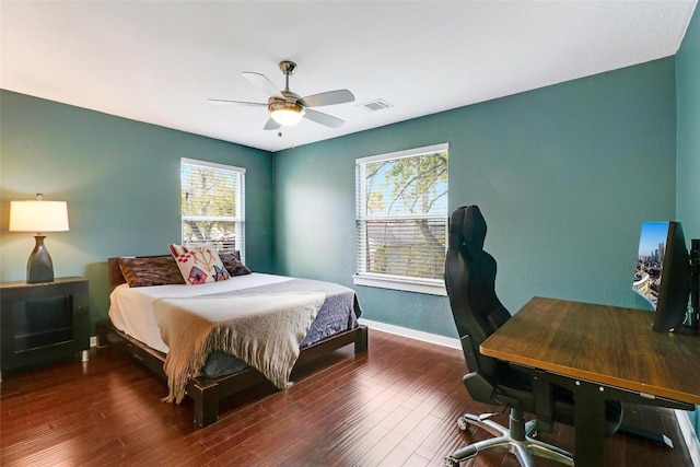 bedroom featuring ceiling fan and dark hardwood / wood-style flooring