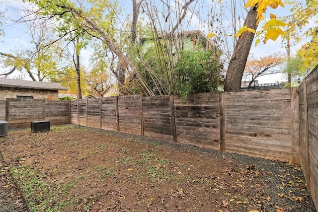 view of yard with central AC