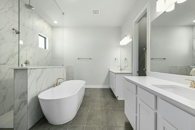 bathroom featuring tile patterned flooring, vanity, and independent shower and bath