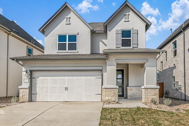 view of front of property with a garage