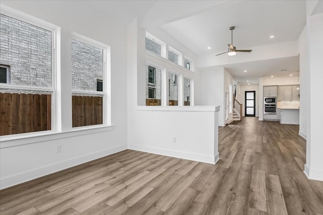 interior space featuring ceiling fan and light hardwood / wood-style flooring