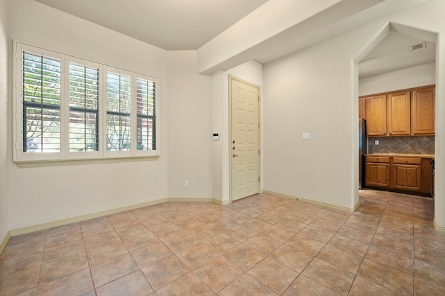 view of tiled spare room